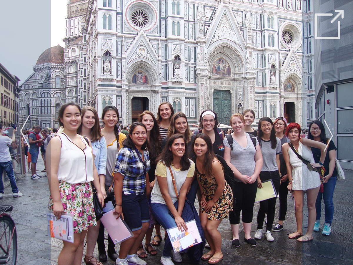 Group photo of students standing on the sidewalk in Florence, Italy