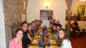 Group photo of students have dinner in Florence, Italy