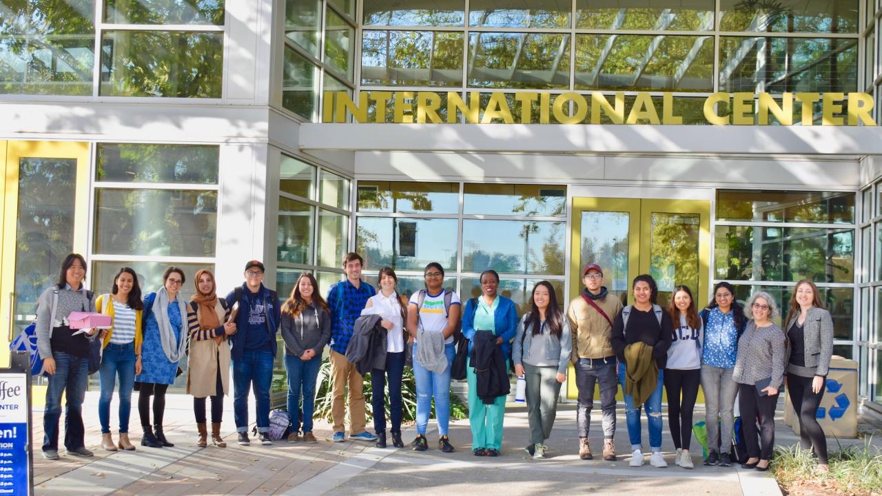 Group of students standing in front of the UC Davis International Center.