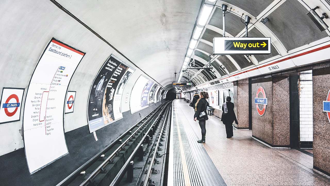 Teaser image of a student standing and waiting in the subway - Click to learn more about this program