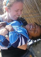 Woman playing with child