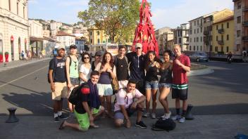 Group photo of students standing on the sidewalk in Florence, Italy