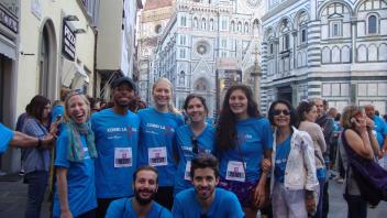 Group photo of students standing in front of an iconic building in Florence, Italy