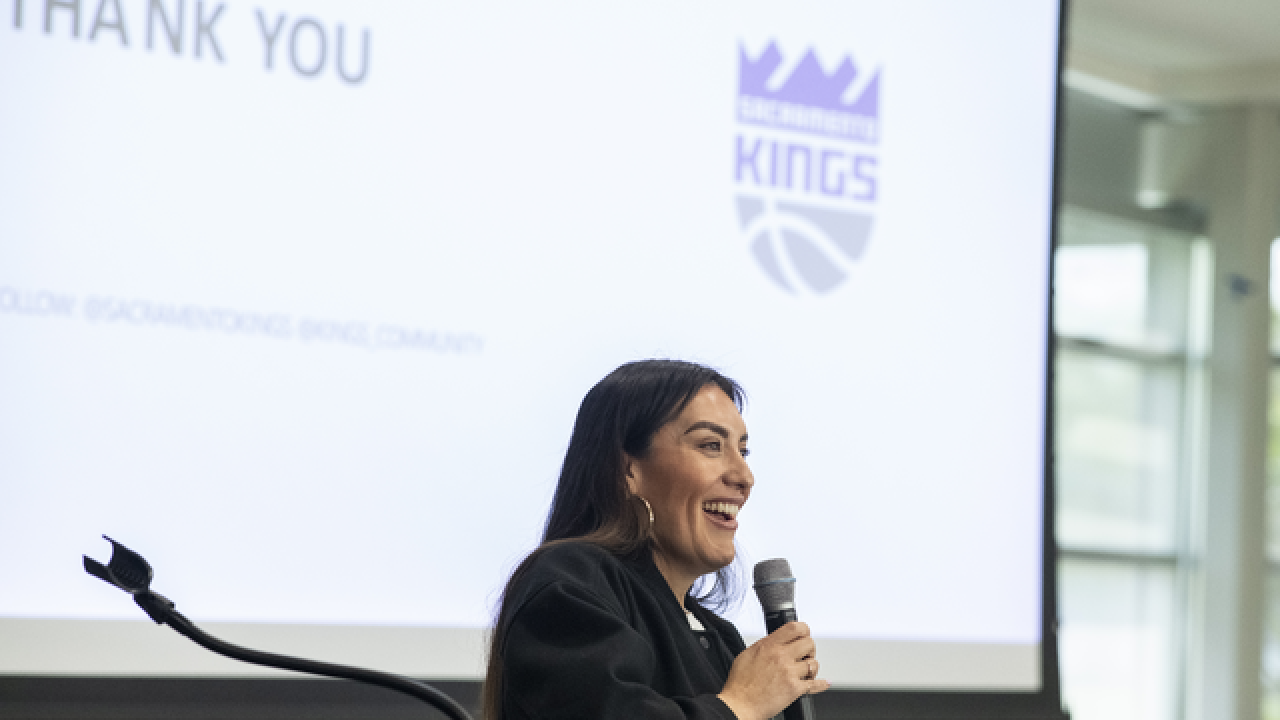 Maritza Davis, Vice President of Experiences & Social Responsibility for the Sacramento Kings, giving the keynote address.