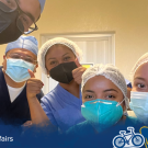 Image of student in scrubs and masks during a surgical tools lesson 