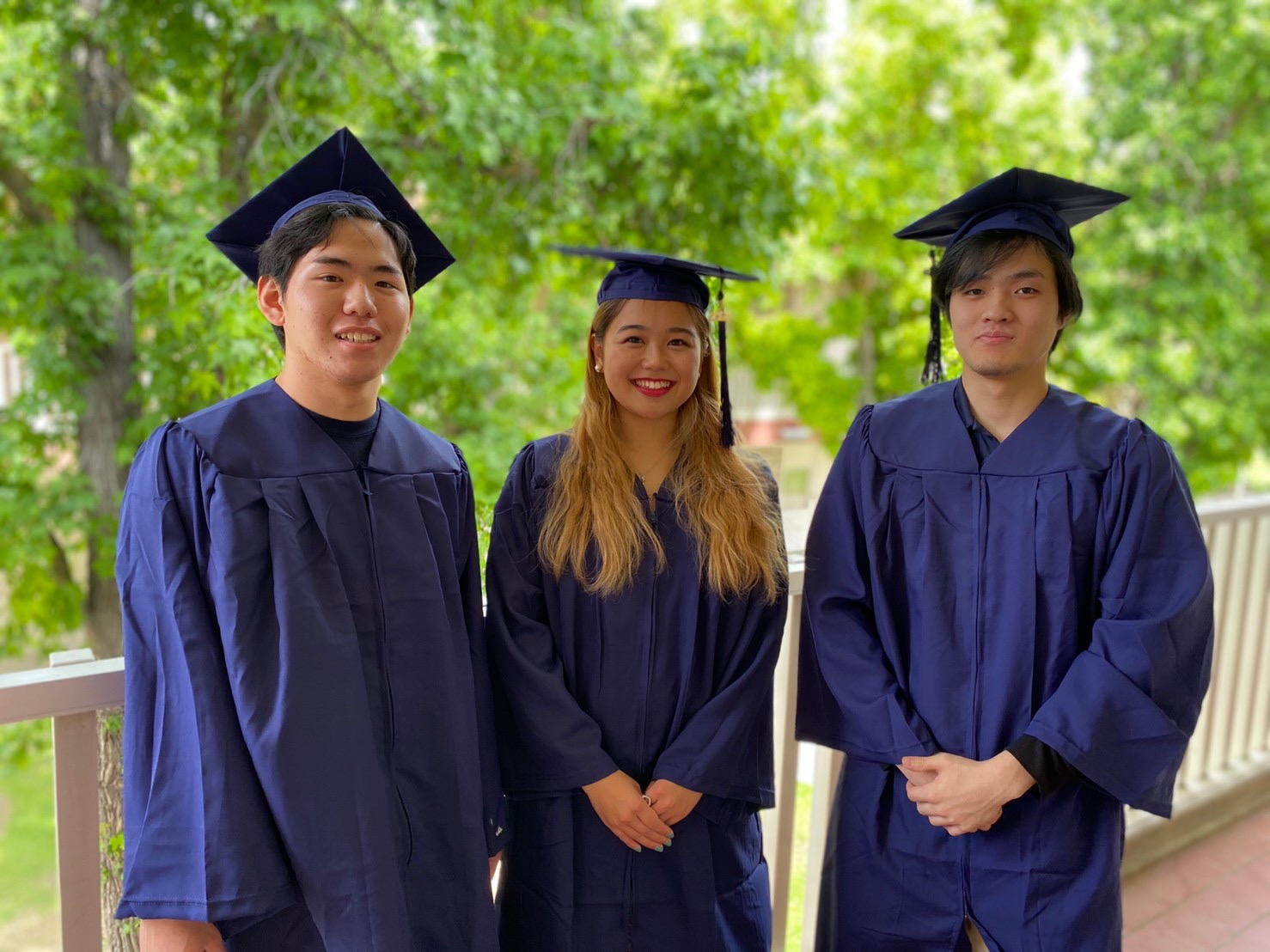 Hatano (right) graduating alongside his friends from Merced City College in 2020.
