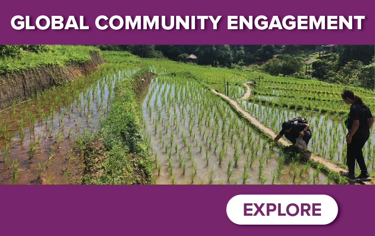 Terraced rice fields with two students and text reading "Global Community Engagement" and "Explore."  Transcribed Text:  GLOBAL COMMUNITY ENGAGEMENT EXPLORE