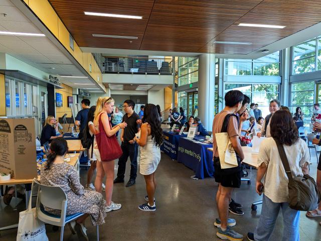 Students interacting at a Global Learning Hub event in the International Center at UC Davis..